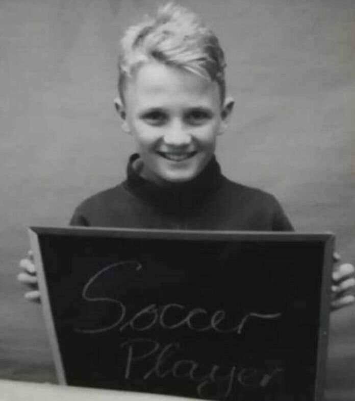 Mark O'Mahony in school displaying what he would like to be when he was older: 'soccer player'. 