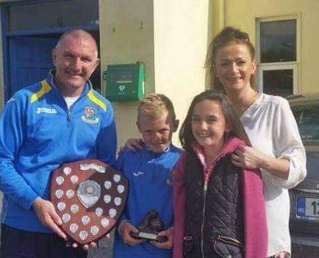 Mark O'Mahony with one of his Player of the Year trophies, with his father Paul, sister Sophie and mother Marian. 