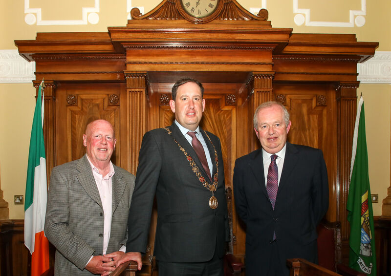 Lord Mayor of Cork, Cllr. Kieran McCarthy with Eddie O'Hare and Denis Minihane at the City Hall to honour the photographers for their contribution to the city for the past 45 years. Picture: David Creedon