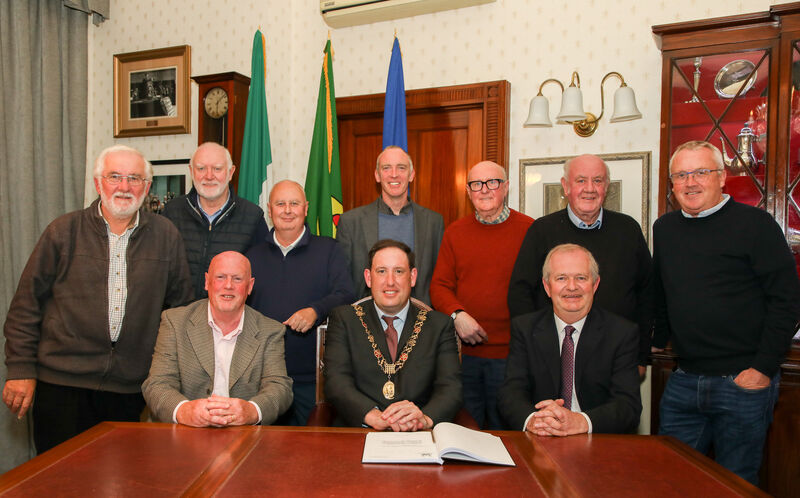 Photographers who attended a reception hosted by the Lord Mayor of Cork, Cllr. Kieran McCarthy to honour photographers Eddie O'Hare and Denis Minihane at the City Hall were (Back Row) Richard Mills, David Keane, Jim Coughlan, Larry Cummins, Michael English, George Hatchell and Dan Linehan (Front) photographers Eddie O'Hare, Lord Mayor of Cork, Cllr. Kieran McCarthy and Denis Minihane. - Picture: David Creedon