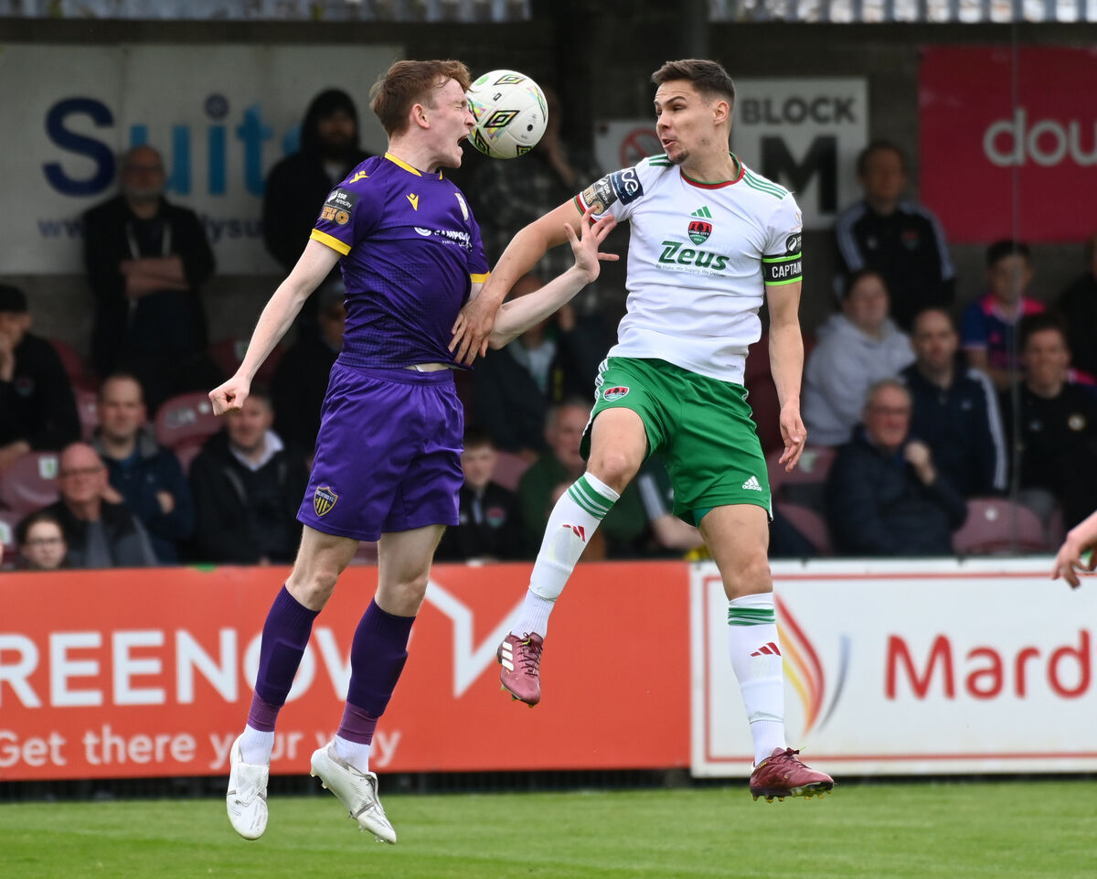 Cork City's Cian Coleman goes high with Wexford FC's Cian O'Malley during the SSE Airtricity First Division game at Turner's Cross. FC Picture: Eddie O'Hare
