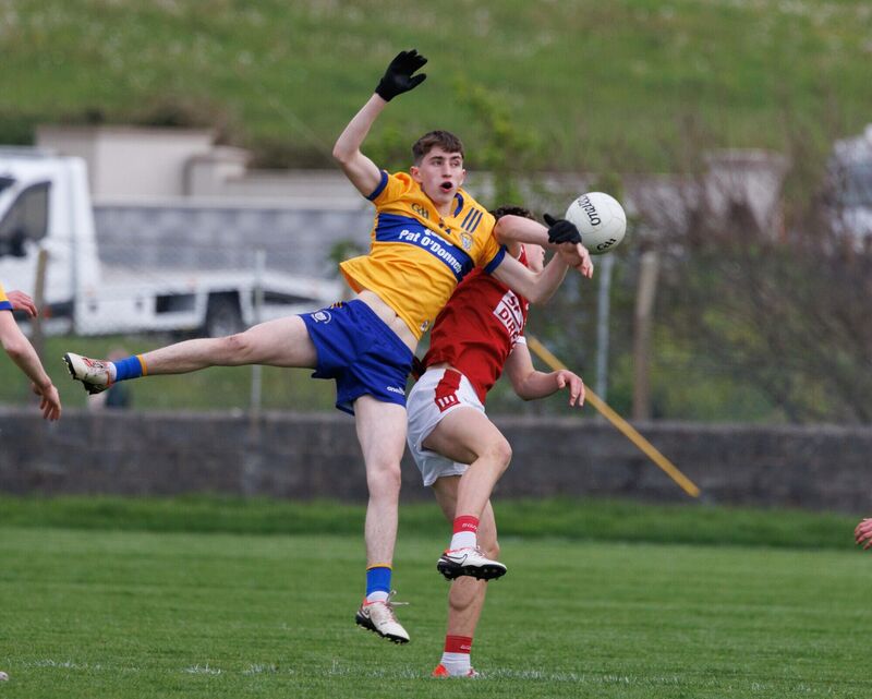 Cork’s Aaron Keane and Clare’s Shane O'Connell in action during the Clare V Cork Munster Minor Football Championship match at Páirc Mhuire Quilty. Picture : Eamon Ward Cork’s Aaron Keane and Clare’s Shane O'Connell in action during the Clare V Cork Munster Minor Football Championship match at Páirc Mhuire Quilty. Picture : Eamon Ward