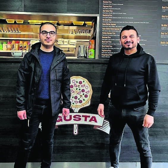 Journalist Çağdaş Gökbel and Alex Sahin of Gusta Pizza-Grill.