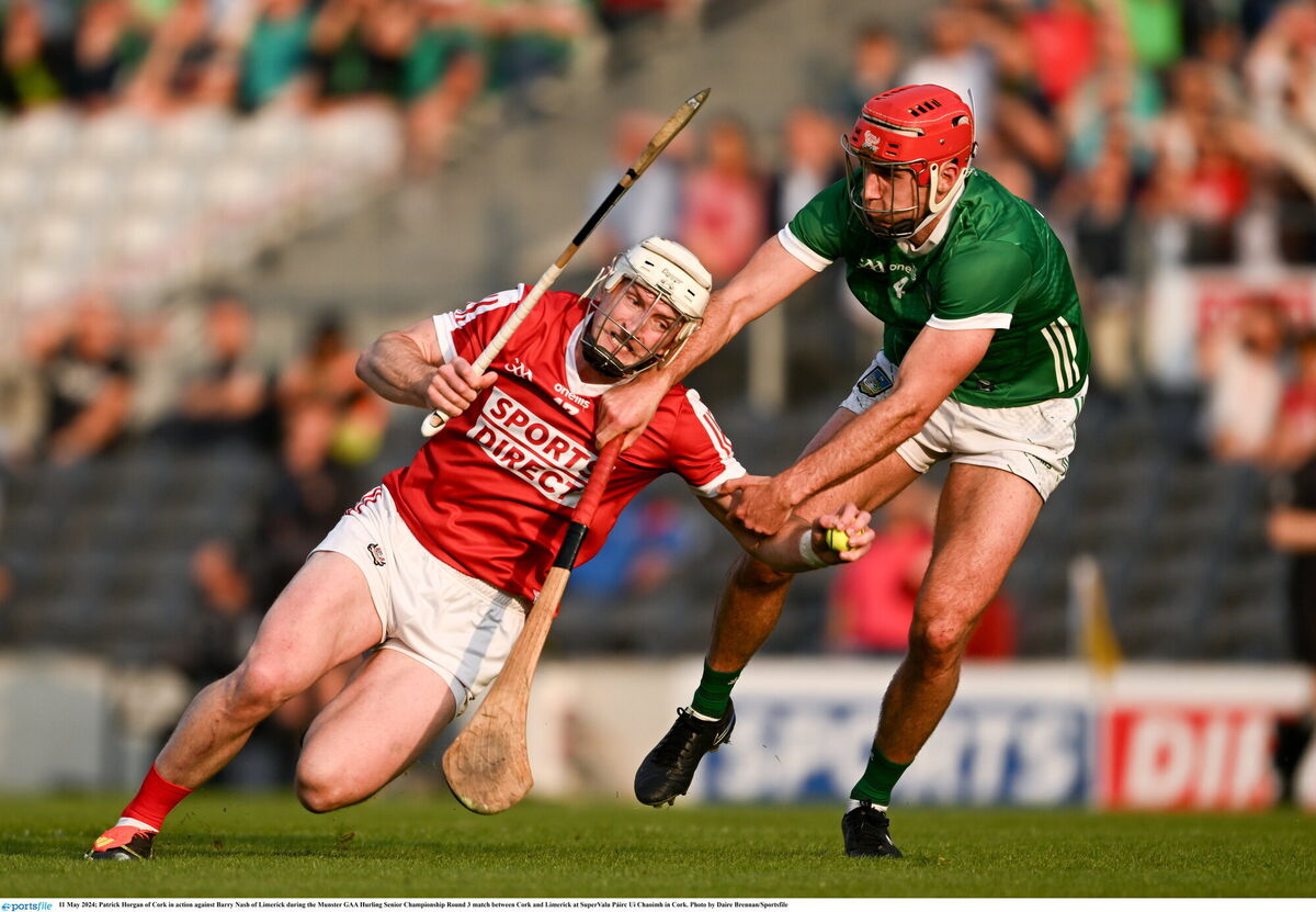 Patrick Horgan of Cork tries to get past Limerick's Barry Nash. Picture: Daire Brennan/Sportsfile