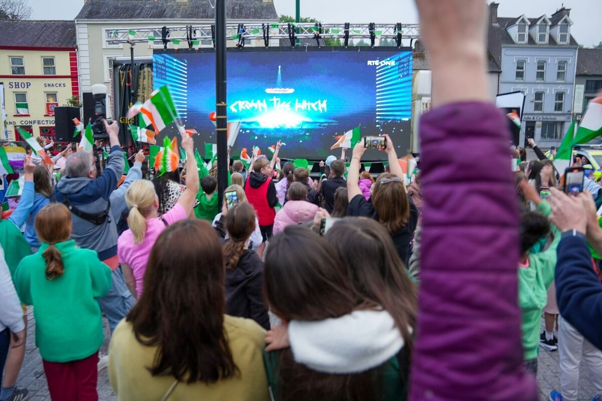 People attend a watch-along party in the town square of Ireland's Eurovision entrant Bambie Thug's hometown of Macroom Photo: Noel Sweeney/PA Wire