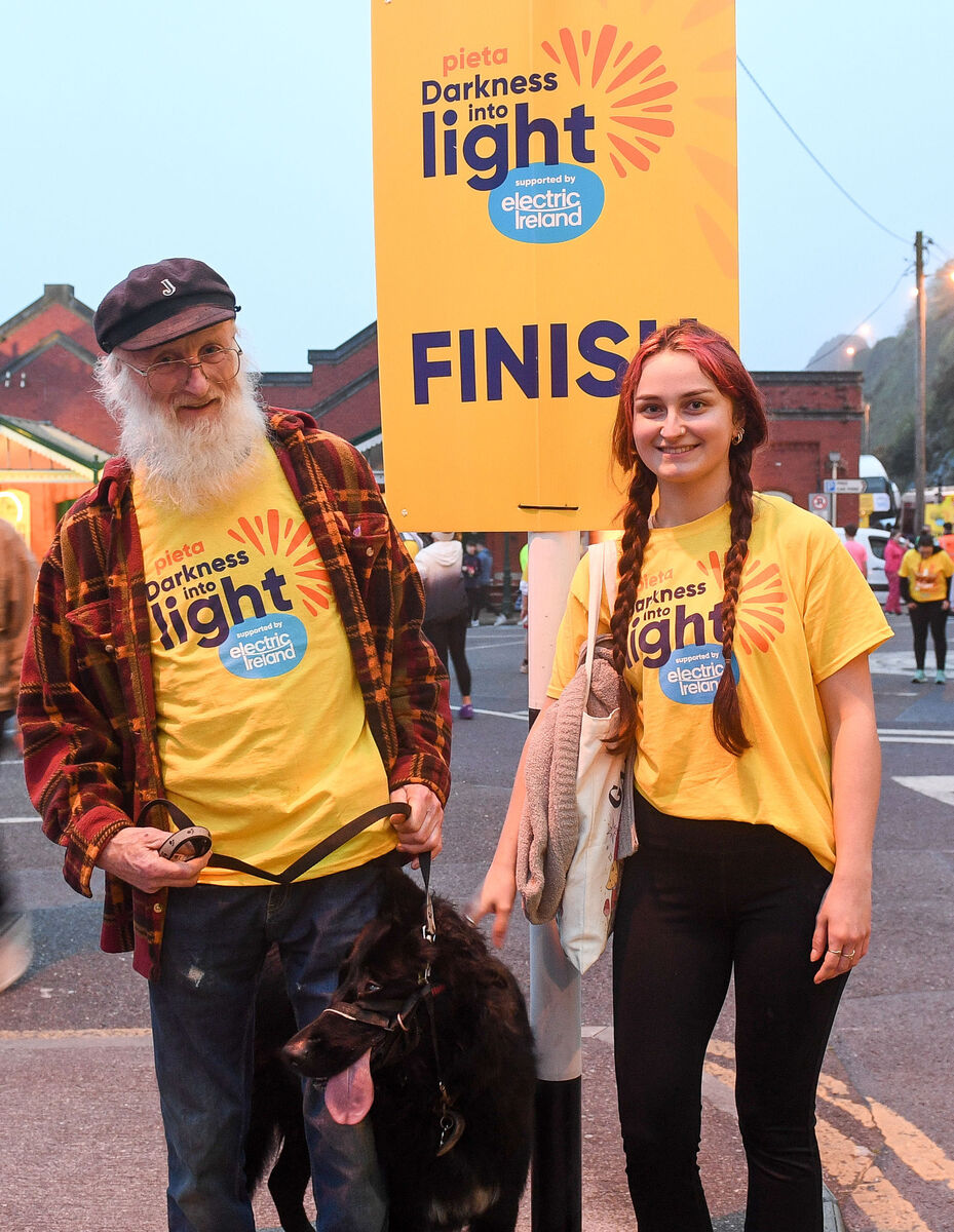 Douglas and Mary Black and Sparkles in Cobh after completing the Darkness into Light walk in aid of Pieta Picture: David Keane.