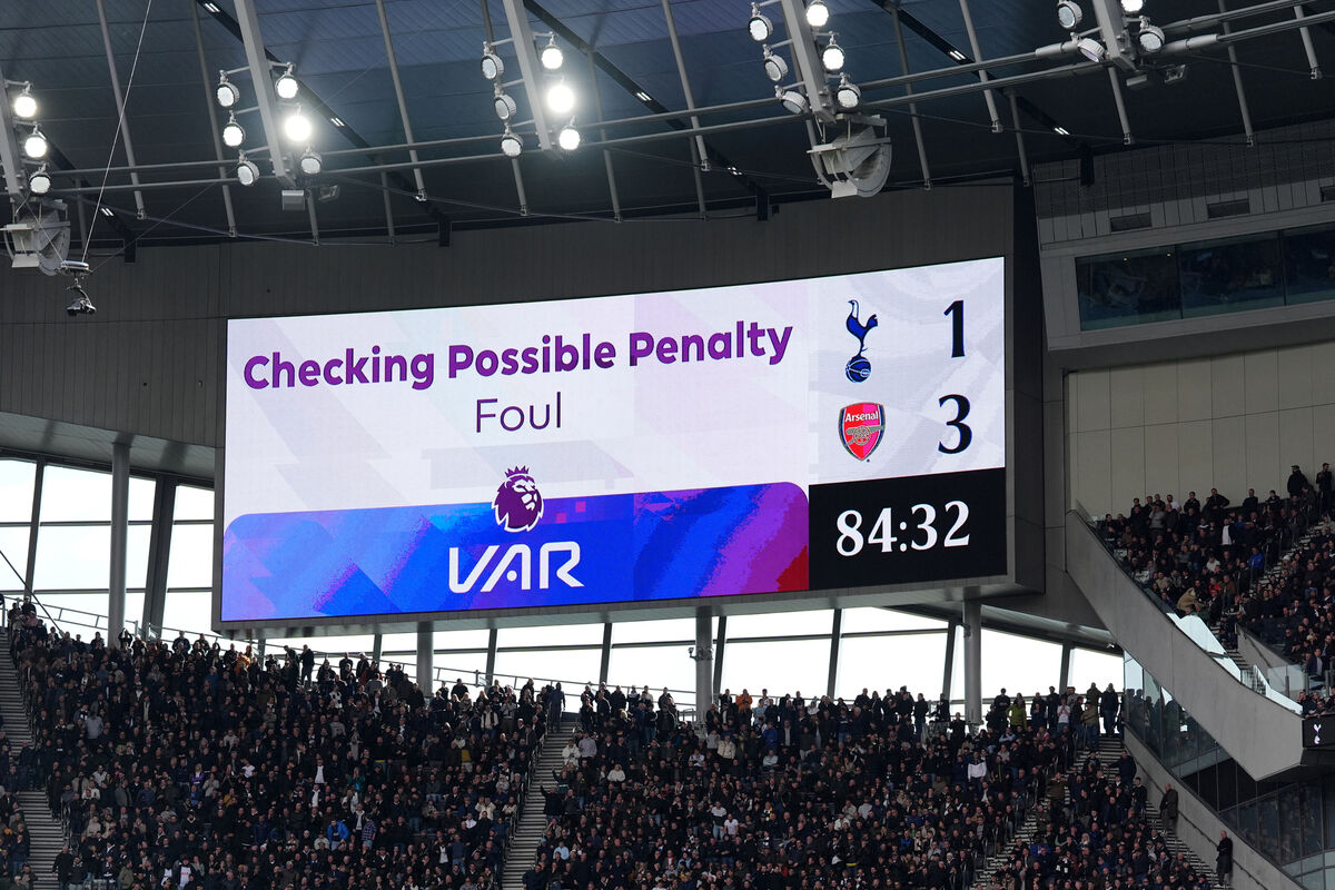 Fans await  a VAR review before awarding Tottenham Hotspur a penalty during the Premier League match against Arsenal at the Tottenham Hotspur Stadium, London. 