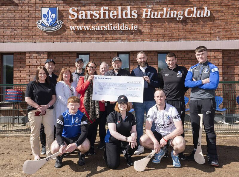 Back row Mary Hackett ,Dee O'Rourke, Sarah McCarthy, Tim O'Driscoll, Mark Dineen, Harry Cogan, Danny McCarthy from Sarsfields with Sean Cunningham, Jacopo Garavaglia, and Cathal McDonnell from Domino's. Front Row: Conor O'Rourke, Daniel Hogan from Sarsfields and Gemma Power from Domino’s pictured at Sarsfields GAA club. Photo credit: Gerard McCarthy. Back row Mary Hackett ,Dee O'Rourke, Sarah McCarthy, Tim O'Driscoll, Mark Dineen, Harry Cogan, Danny McCarthy from Sarsfields with Sean Cunningham, Jacopo Garavaglia, and Cathal McDonnell from Domino's. Front Row: Conor O'Rourke, Daniel Hogan from Sarsfields and Gemma Power from Domino’s pictured at Sarsfields GAA club. Photo credit: Gerard McCarthy.