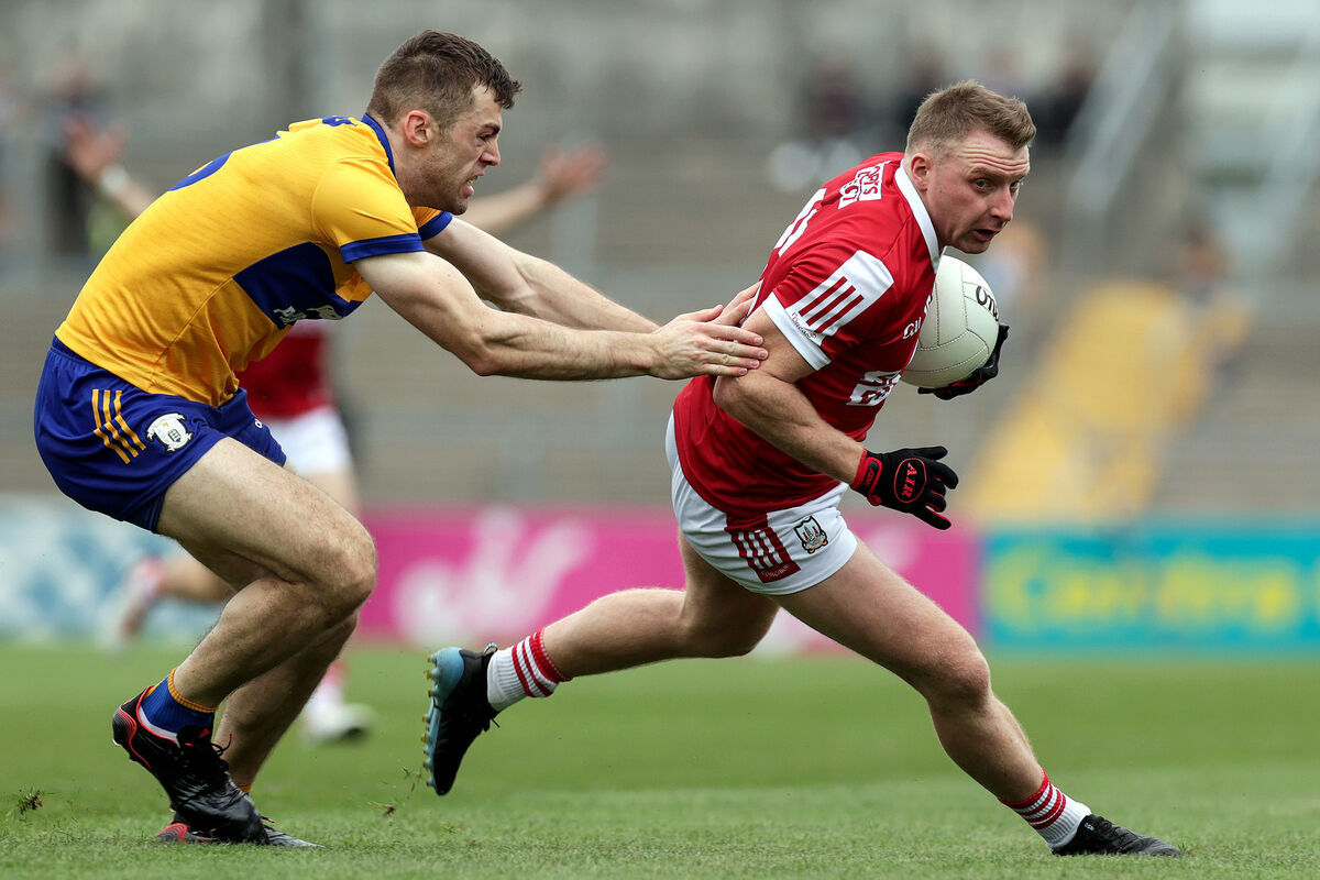Cork's Brian Hurley and Cillian Brennan of Clare. Picture: INPHO/Laszlo Geczo
