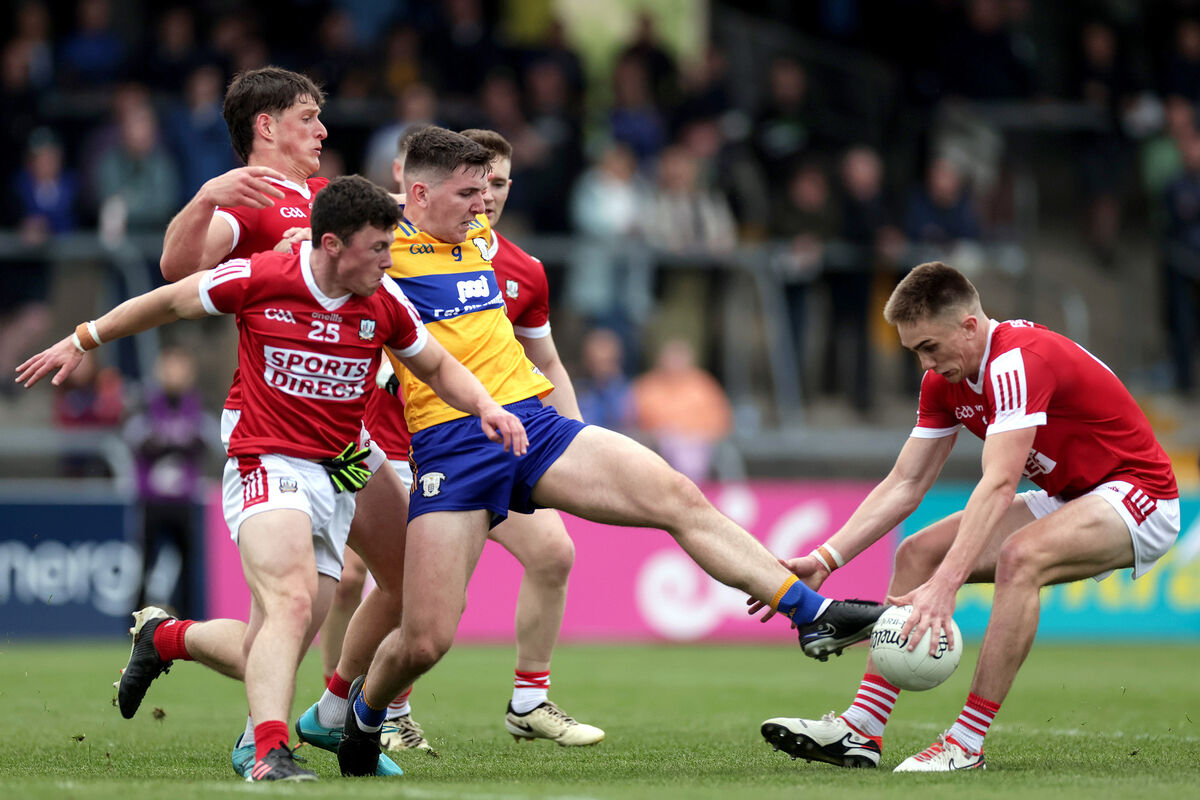 Clare's Brian McNamara and Tommy Walsh of Cork in action. Picture: INPHO/Laszlo Geczo