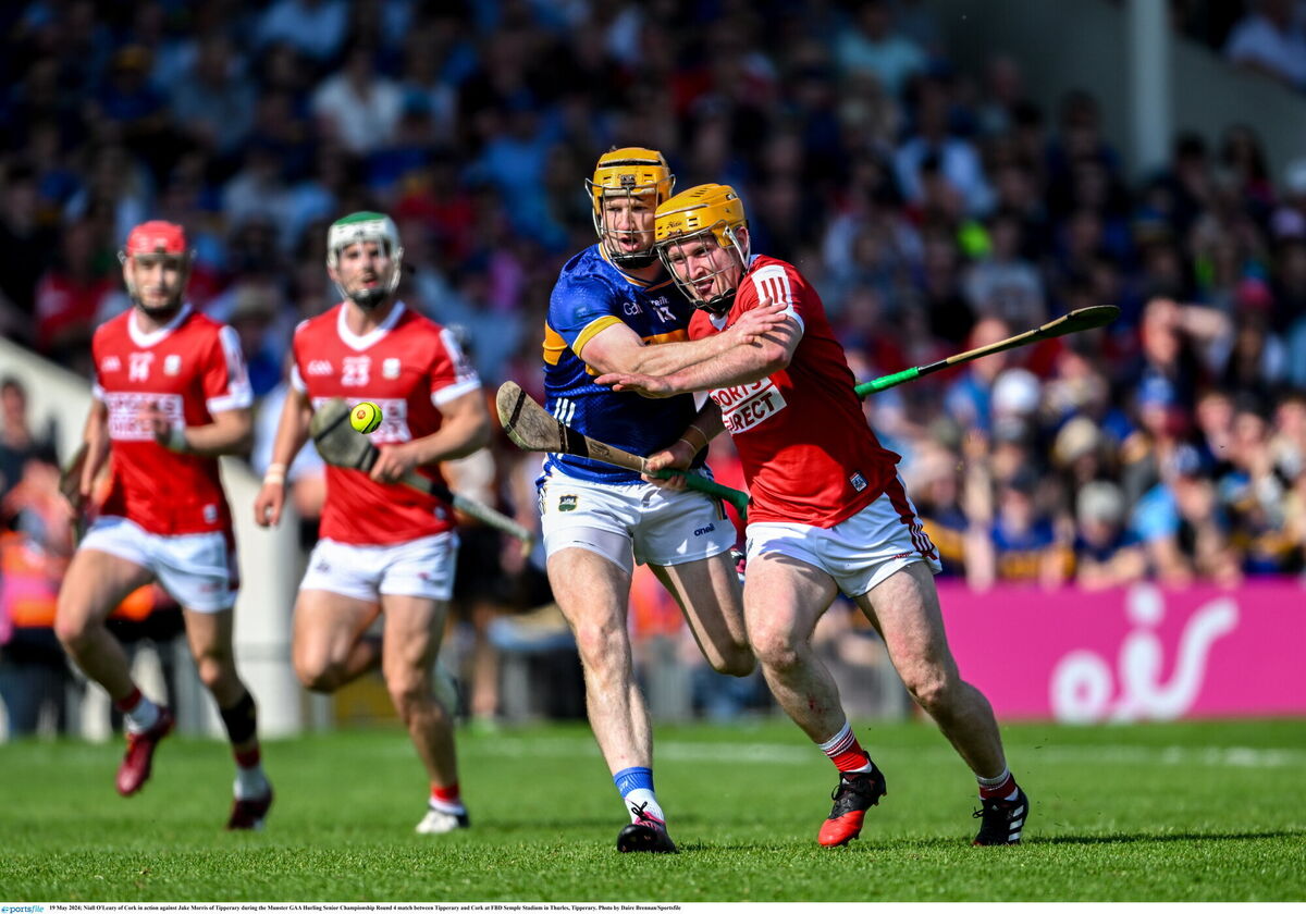 Niall O'Leary of Cork in action against Jake Morris of Tipperary. Picture: Daire Brennan/Sportsfile