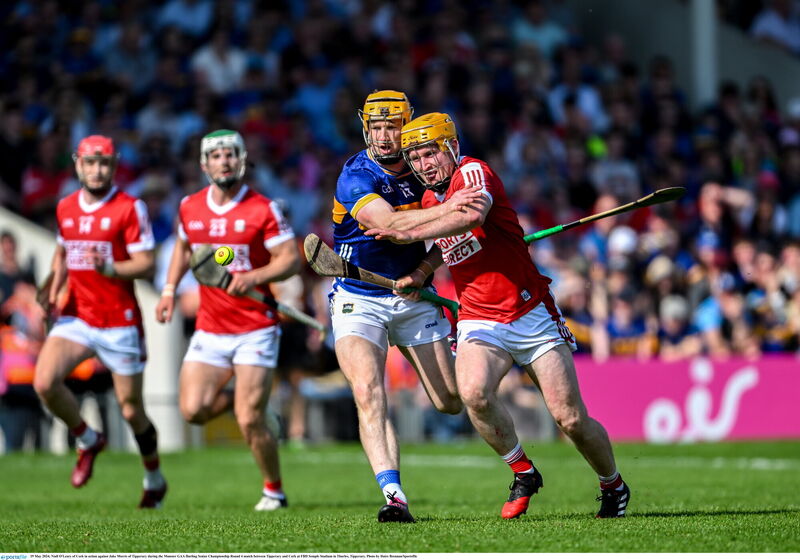 Niall O'Leary of Cork in action against Jake Morris of Tipperary. Picture: Daire Brennan/Sportsfile