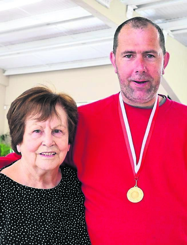 Event organiser Phil Goodman with the Rehab Care team captain David Hogan at the annual Young at Heart kurling competition held at the Douglas GAA Club hall.