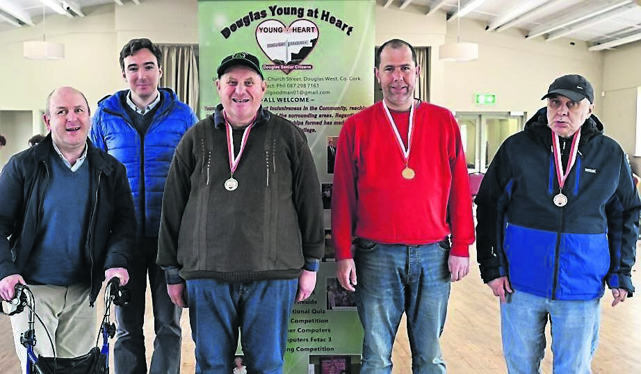 The team from Rehab Care with their medals at the kurling competition.
