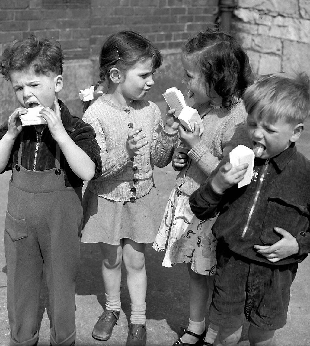 Children enjoying their ice creams in Cork city in April, 1954. What summer activities do you remember from your childhood?