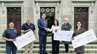Lord Mayor presents cheques to Charity Ball beneficiaries