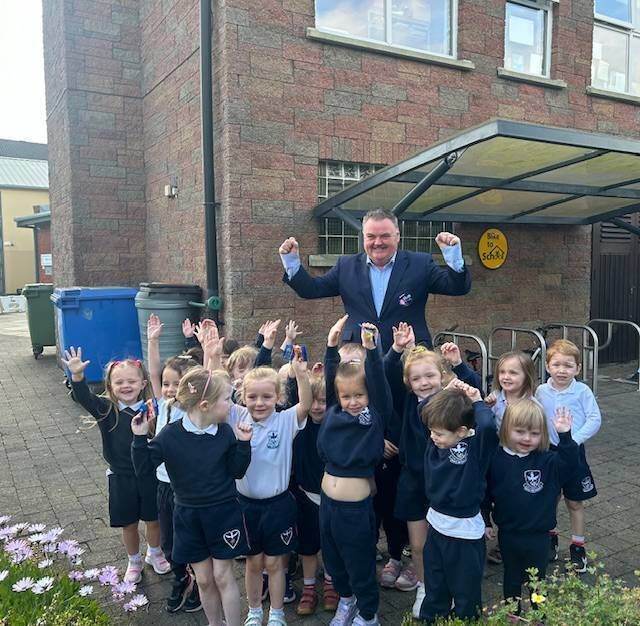 John Mullins with the young pupils in Bishopstown. 
