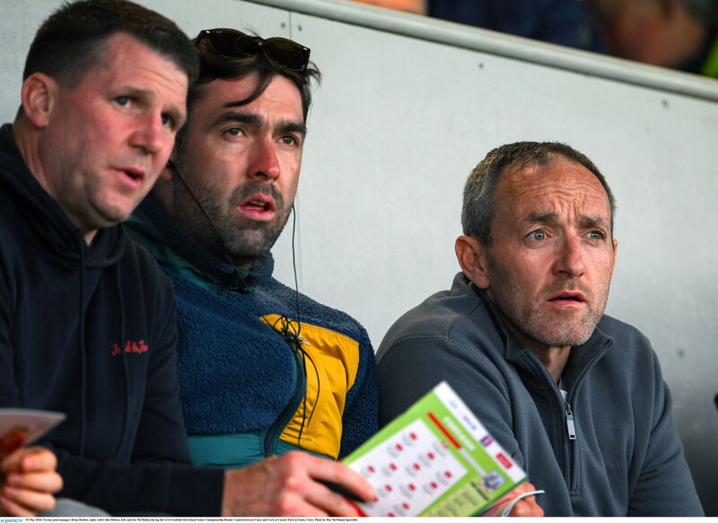 Tyrone joint-manager, Brian Dooher, right, with Colin Holmes, left, and Joe McMahon during Clare v Cork last weekend. Picture: Ray McManus/Sportsfile Tyrone joint-manager, Brian Dooher, right, with Colin Holmes, left, and Joe McMahon during Clare v Cork last weekend. Picture: Ray McManus/Sportsfile