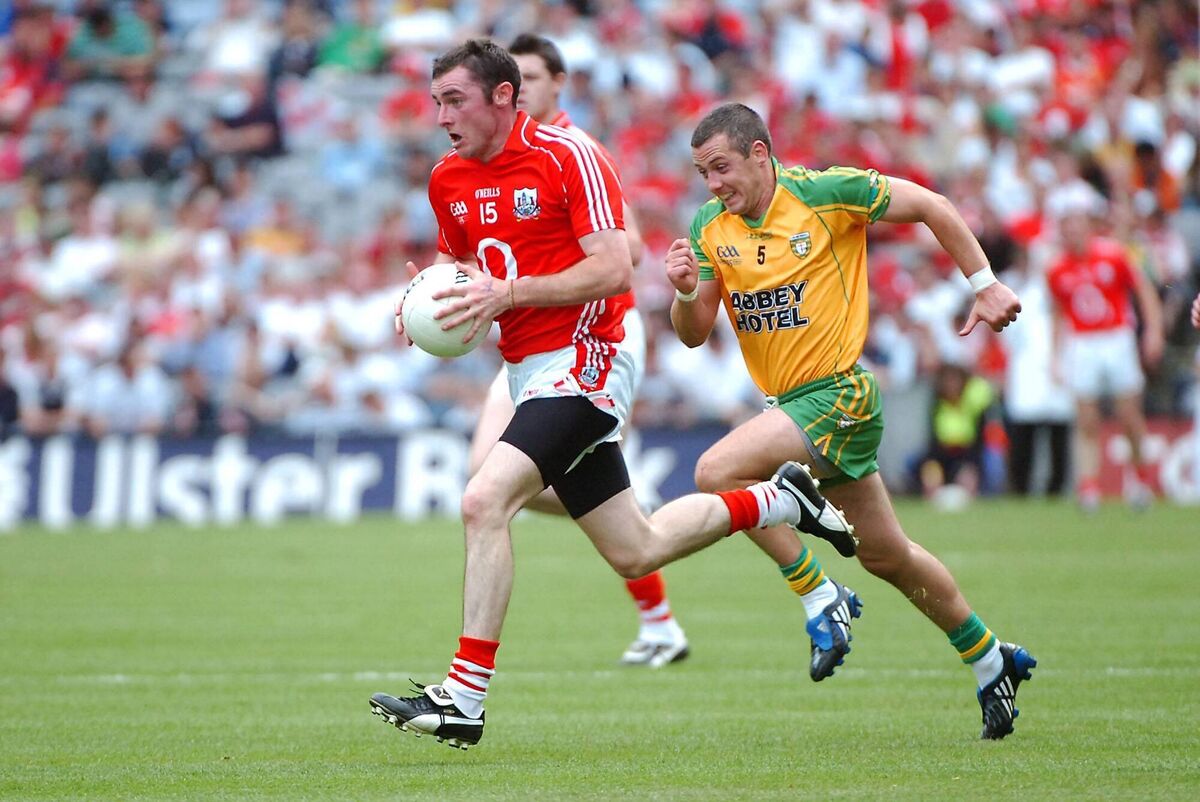 Donncha O'Connor of Cork gets away from Donegal's Barry Dunnion. Picture: Larry Cummins