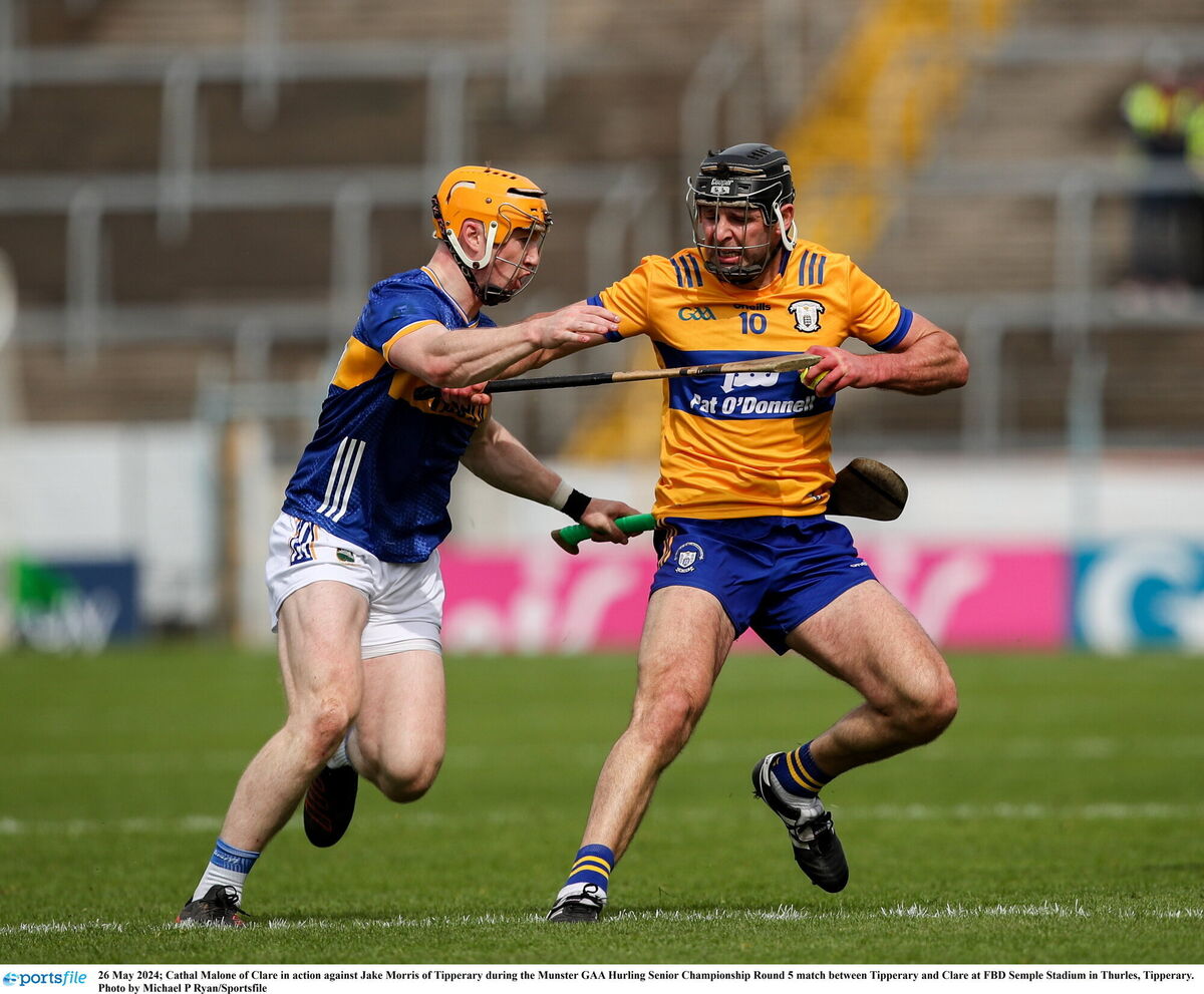 Cathal Malone of Clare holds possession against Tipperary's Jake Morris in the Munster SHC game at FBD Semple Stadium in Thurles. Picture: Michael P Ryan/Sportsfile