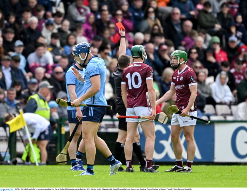 Referee Colm Lyons shows a red card to David Burke of Galway. Picture: Daire Brennan/Sportsfile