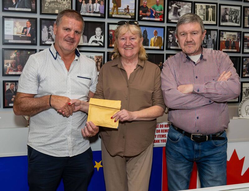 Gordon Joyce and Mick Nagle of Sunnyside BC presenting Caitríona Twomey of Cork Penny Dinners with the proceeds of a raffle held at the recent tournament held at St Vincent's GAA Club. Picture: Doug Minihane Gordon Joyce and Mick Nagle of Sunnyside BC presenting Caitríona Twomey of Cork Penny Dinners with the proceeds of a raffle held at the recent tournament held at St Vincent's GAA Club. Picture: Doug Minihane