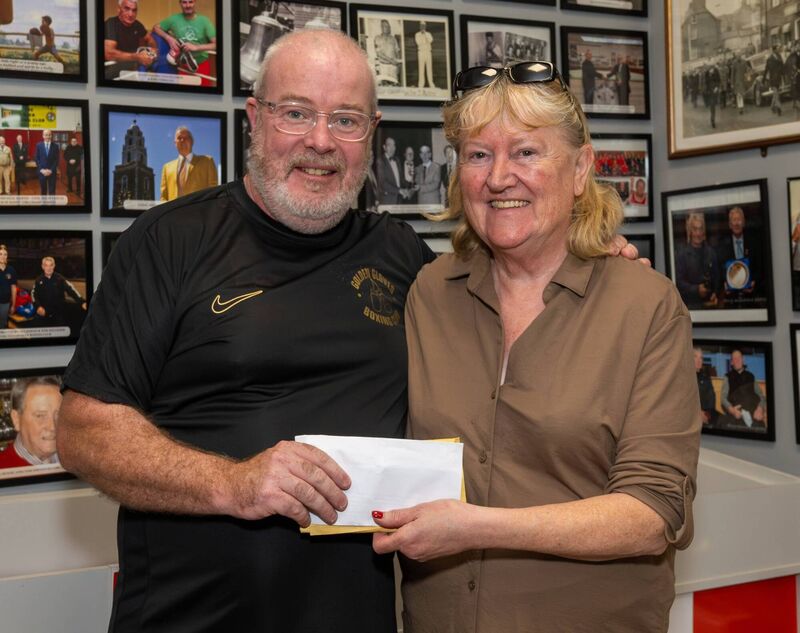 Cork Boxing: John Morrissey of Golden Gloves BC presenting Caitríona Twomey of Cork Penny Dinners with the proceeds of the very successful Senior tournament organised by Morrissey at the Northside Boxing Club. Picture: Doug Minihane Cork Boxing: John Morrissey of Golden Gloves BC presenting Caitríona Twomey of Cork Penny Dinners with the proceeds of the very successful Senior tournament organised by Morrissey at the Northside Boxing Club. Picture: Doug Minihane