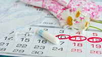 Woman hygiene protection , calendar close up.menstruation with cotton swabs