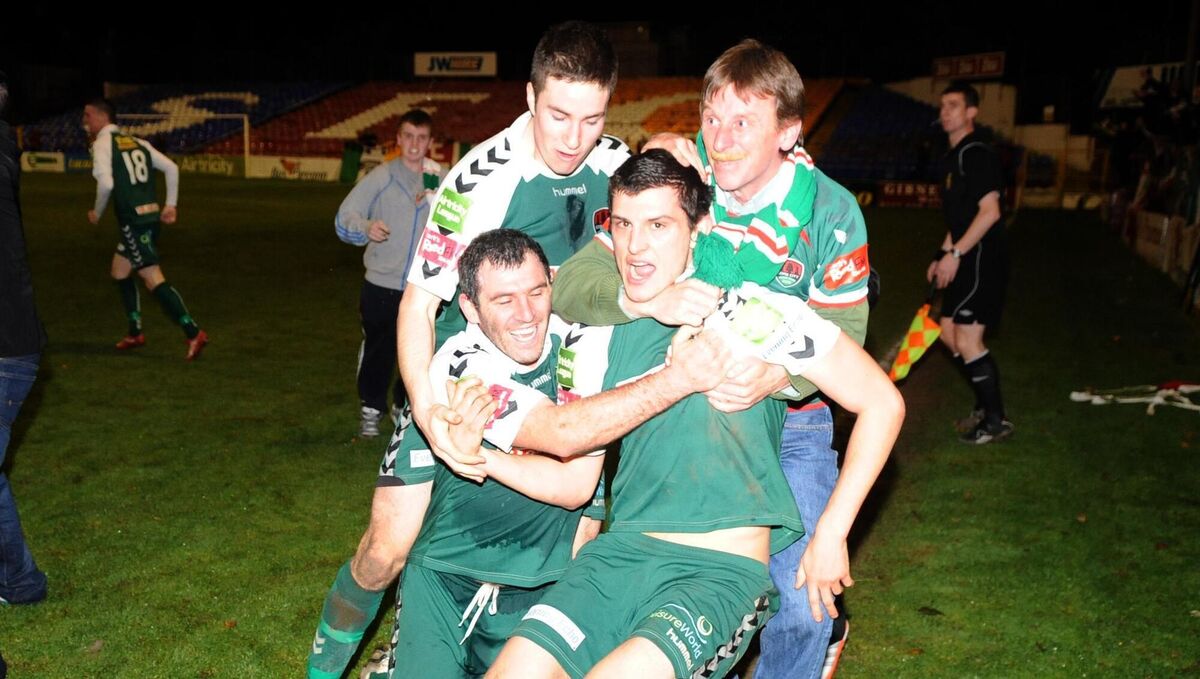Cork City Graham Cummins is congratulated by Greg O'Halloran and Gearoid Morrisey and fans just after scoring scoring the match winning goal against Shelbourne in 2011. Picture: Eddie O'Hare