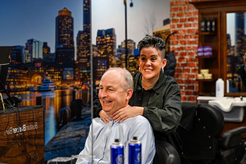 Mary Hayes from Boston Barbers wrings Tánaiste Micheál Martin’s neck over housing while he canvassed with Billy Kelleher, Mary Rose Desmond and David Boyle in Douglas Village shopping centre on Saturday. Picture Chani Anderson Mary Hayes from Boston Barbers wrings Tánaiste Micheál Martin’s neck over housing while he canvassed with Billy Kelleher, Mary Rose Desmond and David Boyle in Douglas Village shopping centre on Saturday. Picture Chani Anderson