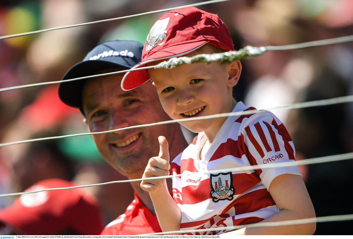 Cork supporter Jamie O'Sullivan (5) and his dad Conor from Rosscarbery. Picture: Matt Browne/Sportsfile