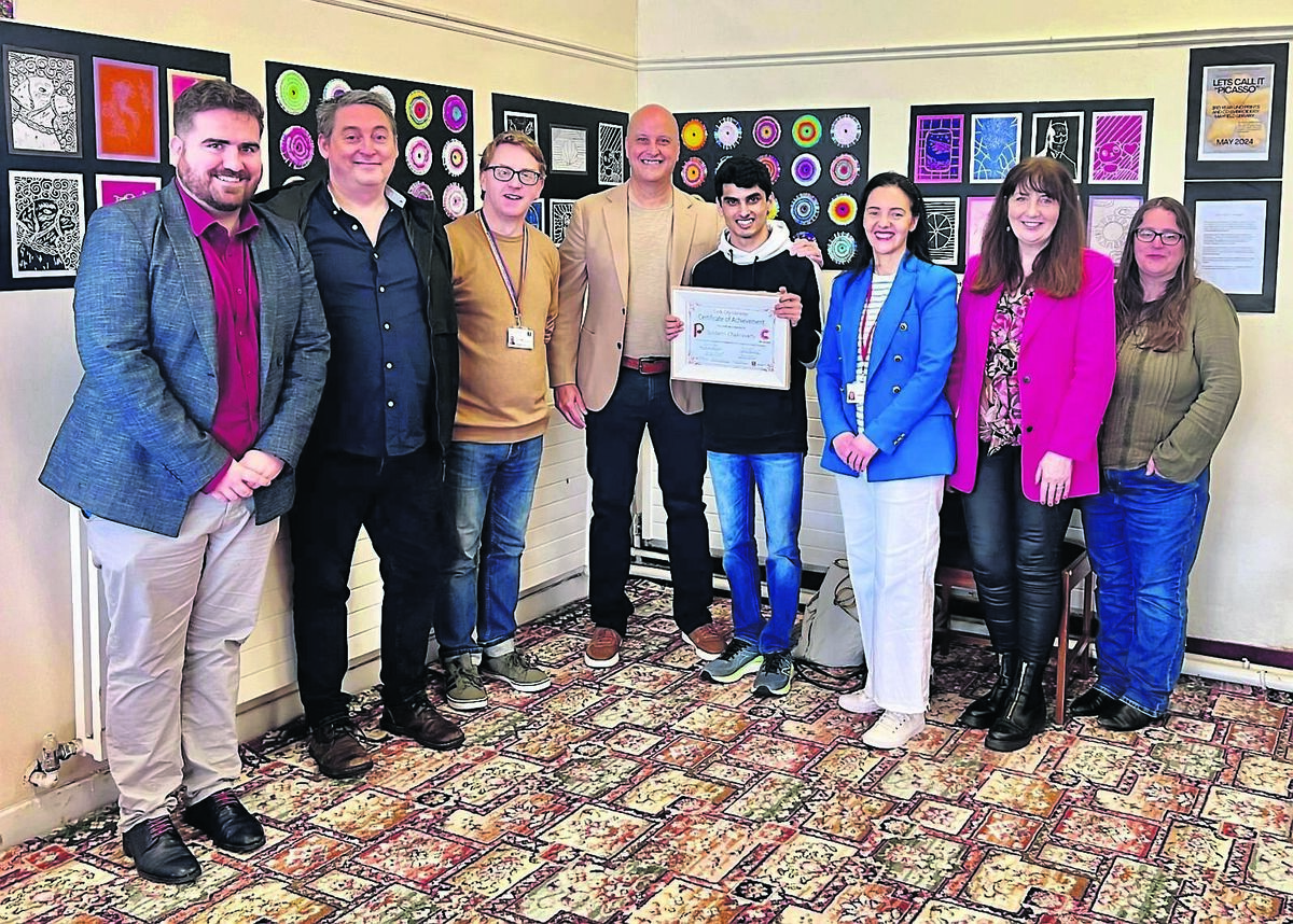 Pictured proudly holding his Level 2 Certificate at Mayfield Library is Siddarth Chakravarty. Siddarth recently completed his work placement with Cork City Libraries which saw him learn and engage with a variety of library tasks. The placement took place in Mayfield and Ballincollig branches and is a collaborative engagement between Cork City Libraries and Ability@Work (COPE). Included (left to right): Olan Ó Sé (Ability@Work), Stephen Leach (Ballincollig mentor), Eoin Healy (Mayfield Library), Amit Charavarty (Siddarth’s dad), Siddarth Chakravarty, Caroline Lynch (Mayfield mentor), Breda Hassett (Progression at Work co-ordinator, Cork City Libraries), and Eibhlín Cassidy (Cork City Libraries). Pictured proudly holding his Level 2 Certificate at Mayfield Library is Siddarth Chakravarty. Siddarth recently completed his work placement with Cork City Libraries which saw him learn and engage with a variety of library tasks. The placement took place in Mayfield and Ballincollig branches and is a collaborative engagement between Cork City Libraries and Ability@Work (COPE). Included (left to right): Olan Ó Sé (Ability@Work), Stephen Leach (Ballincollig mentor), Eoin Healy (Mayfield Library), Amit Charavarty (Siddarth’s dad), Siddarth Chakravarty, Caroline Lynch (Mayfield mentor), Breda Hassett (Progression at Work co-ordinator, Cork City Libraries), and Eibhlín Cassidy (Cork City Libraries).