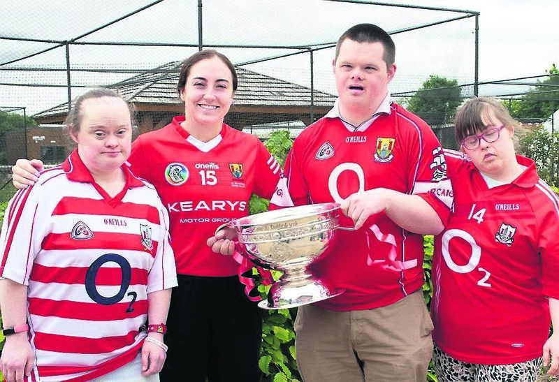 Cork camogie player Amy O’Connor (second left) with Lisa Maher, Ronan Desmond, and Cara O’Flaherty, with the All-Ireland senior camogie cup at the Field of Dreams Centre. Cork camogie player Amy O’Connor (second left) with Lisa Maher, Ronan Desmond, and Cara O’Flaherty, with the All-Ireland senior camogie cup at the Field of Dreams Centre.
