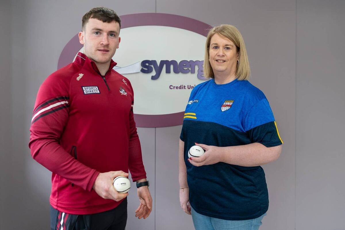 Cork hurler Niall O'Leary with Martina Cotter, Tipperary native and CEO of Synergy Credit Union.