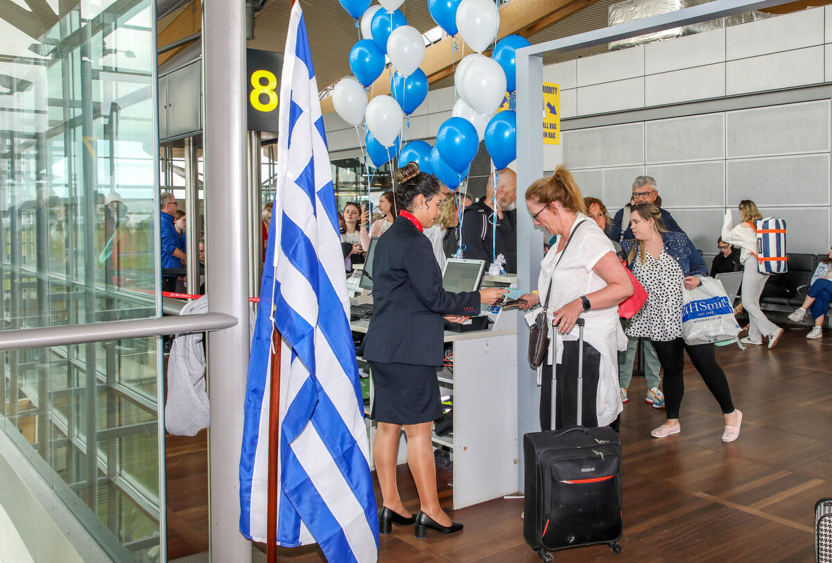 Passengers at the departure gate and about to board the inaugural Ryanair flight to Rhodes from Cork Airport. - Picture: David Creedon