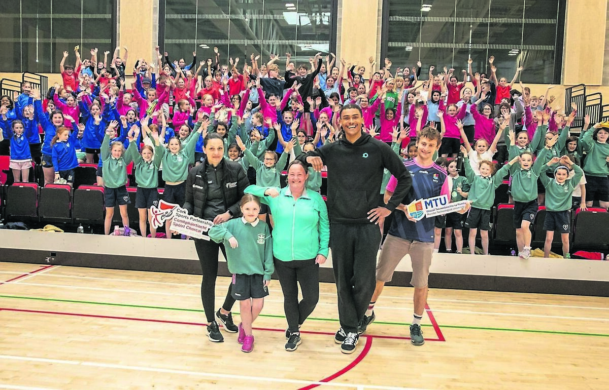 STANDING TALL: Arnolda Stankaitiene (Cork Sports Partnership), Beth Manning (Bishopstown GNS), Annette Power (Bishopstown GNS), Reece Ademola (MTU Studnet &amp; Leevale long jumper) and Craig Harrington (MTU &amp; Cork Sports Partnership) at the recent Cork Sports Partnership Primary Schools Athletics Blitz.	Picture: Colm Lougheed
                    
