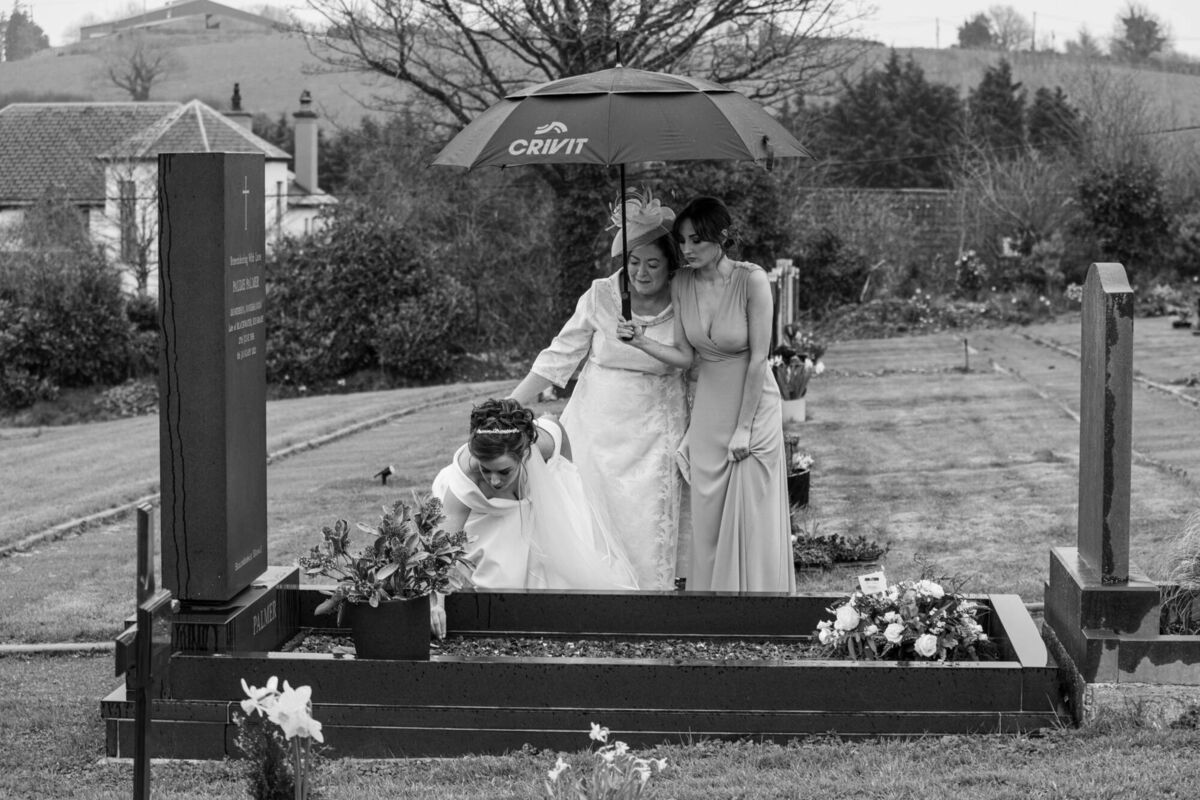 Claire visiting her father Paudie’s grave. Today Claire will take part in the Hell And Back run in Wicklow to raise funds in his memory.