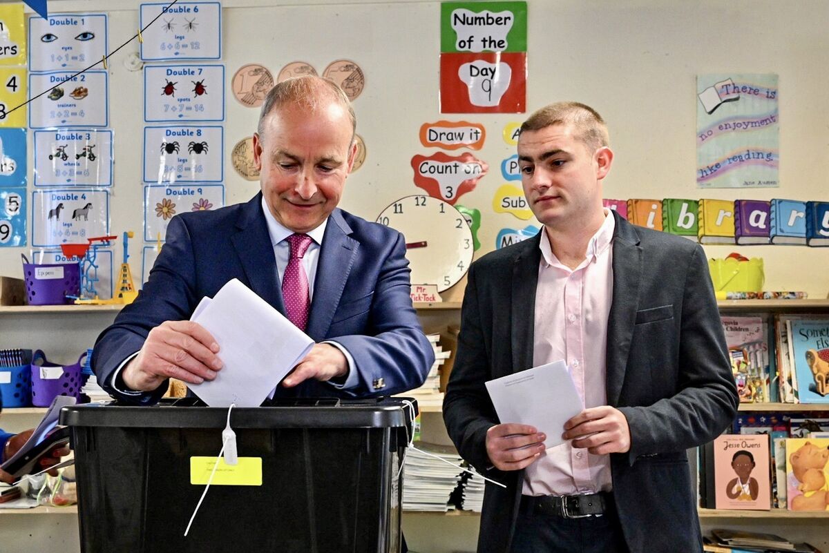 Tánaiste and Úactaráin Fhianna Fáil Micheál Martin pictured with his son Micheal, casts his vote in the local and European elections. Picture Chani Anderson Tánaiste and Úactaráin Fhianna Fáil Micheál Martin pictured with his son Micheal, casts his vote in the local and European elections. Picture Chani Anderson