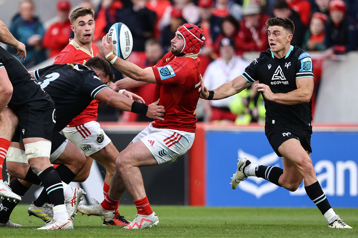 Munster's John Hodnett with Rueben Morgan-Williams of Ospreys. Picture: INPHO/Ben Brady