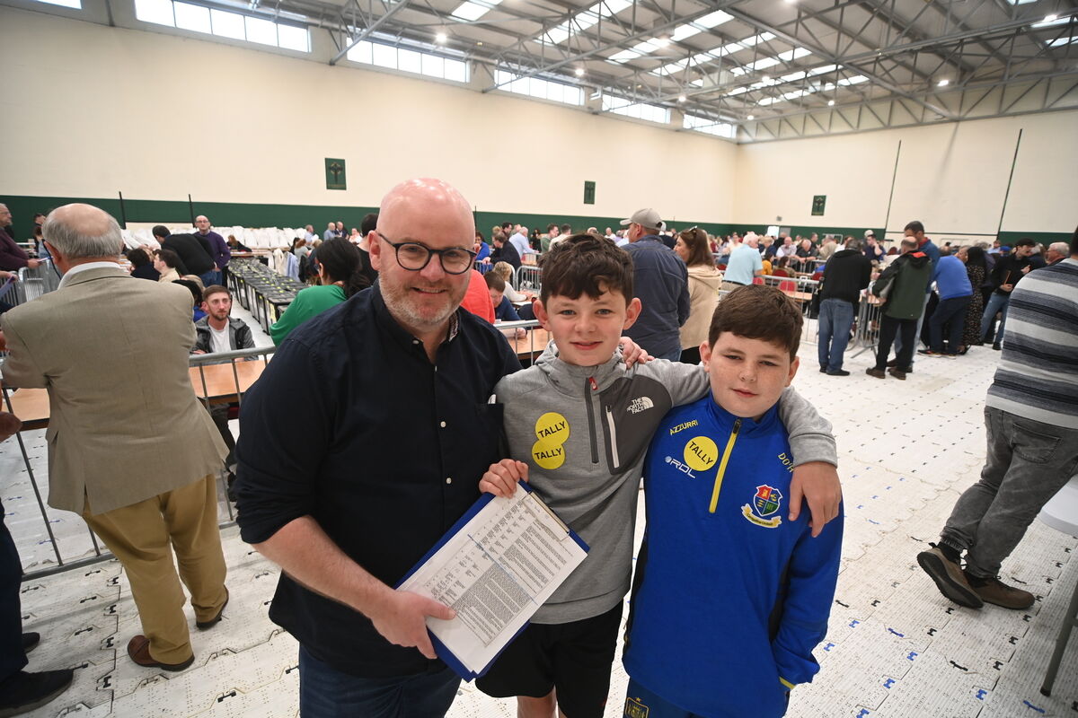 Emmet, Conor and Darragh O'Halloran at the start of the ballot counting at Nemo Rangers on Saturday morning. Pic: Larry Cummins 