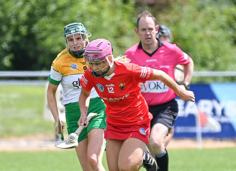  Cork's Edel Sheehan races away from Offaly's Grace Teehan. Picture: David Keane.