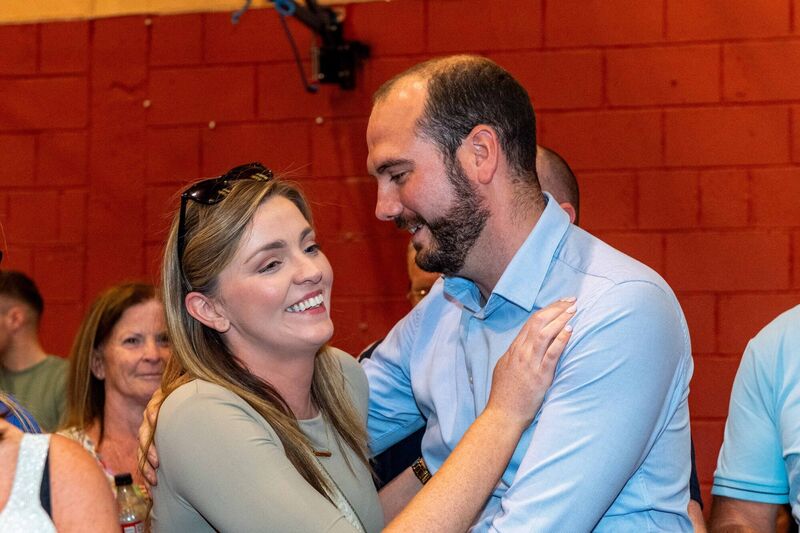 Noel O'Donovan (FG) elected after the 4th count in Skibbereen LEA at Clonakilty Count Centre, celebrating with his girlfriend Natasha Burke. Picture: Andy Gibson.