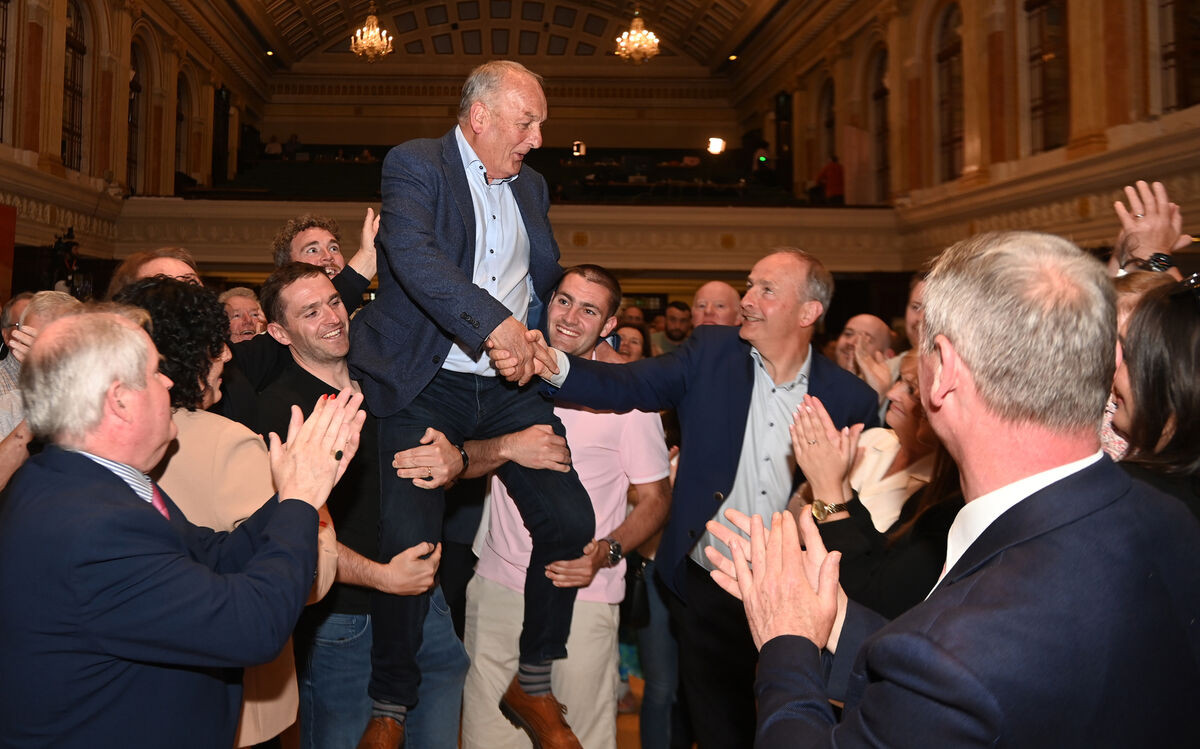  Fianna Fáil candidate Sean Martin is congratulated by his brother Tanaiste Micheal Martin, after his re-election was confirmed at the count at City Hall on Sunday. Pic Larry Cummins