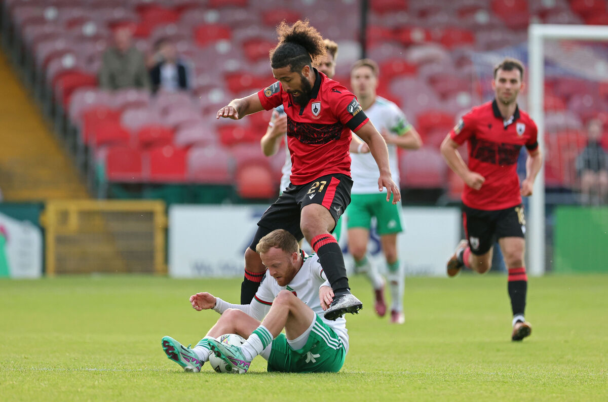  Jack Doherty, Cork City, is tackled by Bastien Hery, Longford Town.