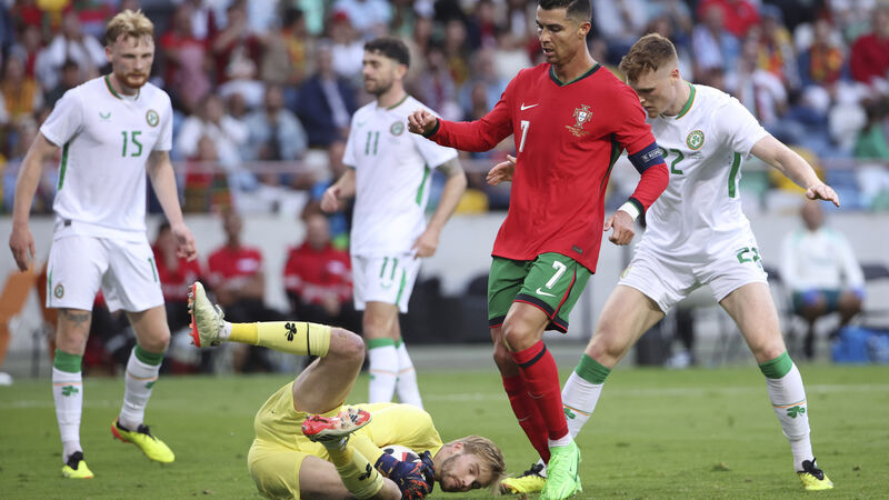 Ireland beaten in Portugal as Cristiano Ronaldo strikes twice despite Caoimhín Kelleher's best efforts Ireland beaten in Portugal as Cristiano Ronaldo strikes twice despite Caoimhín Kelleher's best efforts
