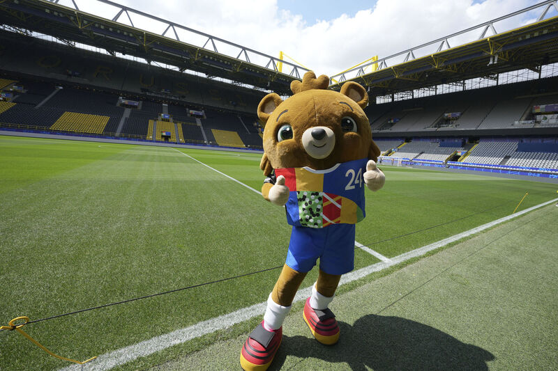 The Euro mascot 'Albärt' poses inside the stadium of German first division, Bundesliga, soccer team Borussia Dortmund in Dortmund, Germany, Picture: AP Photo/Martin Meissner