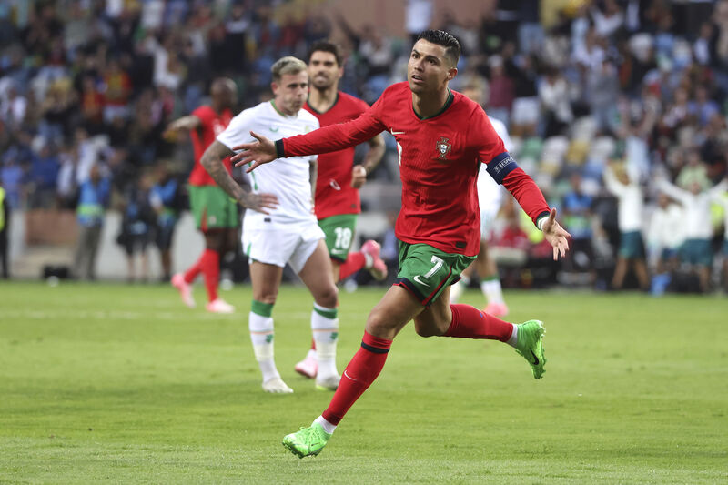 Portugal's Cristiano Ronaldo celebrates after scoring against Ireland during  the friendly on Tuesday in Aveiro, Portugal, Picture: AP Photo/Luis Vieira)
