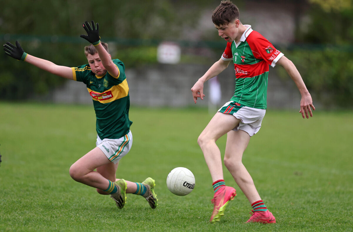 Ballinora's Denis O'Mahony under pressure from John Toomey of St Michael's during the Féile premier 2 football final. Picture: Jim Coughlan