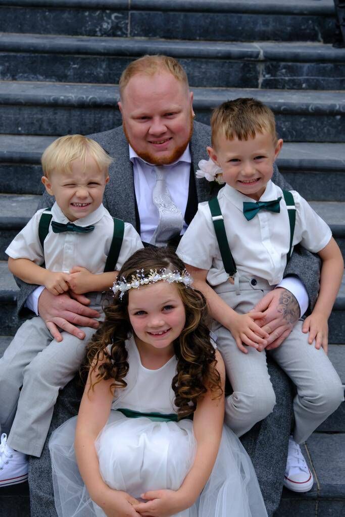 Kevin Kearney with his sons Kyle and Isaac and flower girl and goddaughter Scarlett.