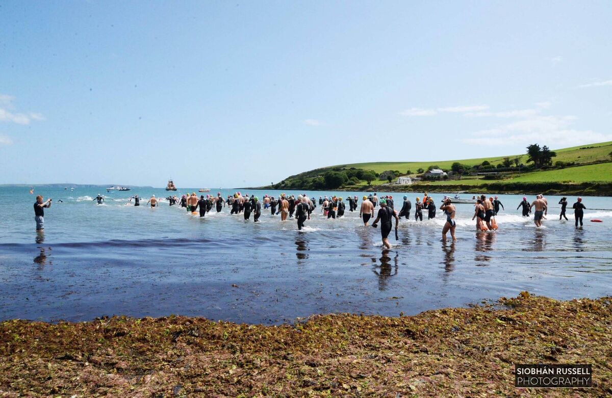Competitors enter the water at Blind Strand for the 9th Annual Courtmacsherry RNLI Swim. RNLI Lifeboat and other safety boats waiting in the distance to acccompany the swimmers. Picture: Siobhan Russell Competitors enter the water at Blind Strand for the 9th Annual Courtmacsherry RNLI Swim. RNLI Lifeboat and other safety boats waiting in the distance to acccompany the swimmers. Picture: Siobhan Russell